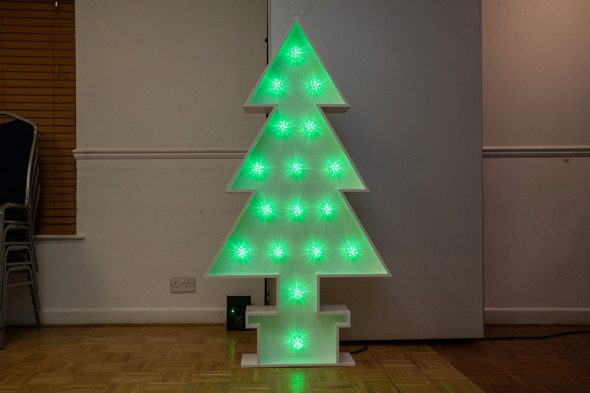 5ft light-up Christmas tree lit green at Aylesbury Tennis Club