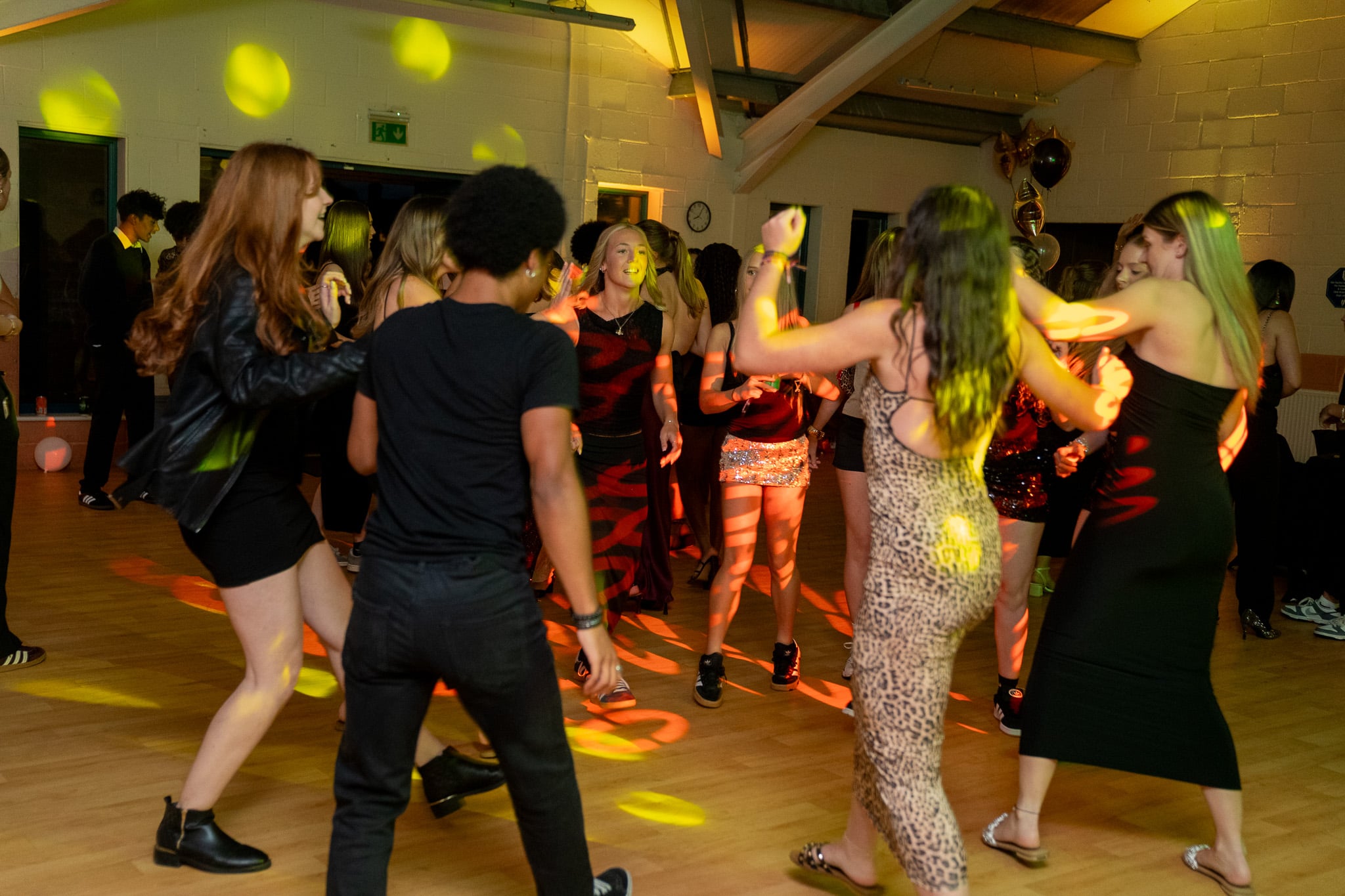 Young guests dancing at an evening party