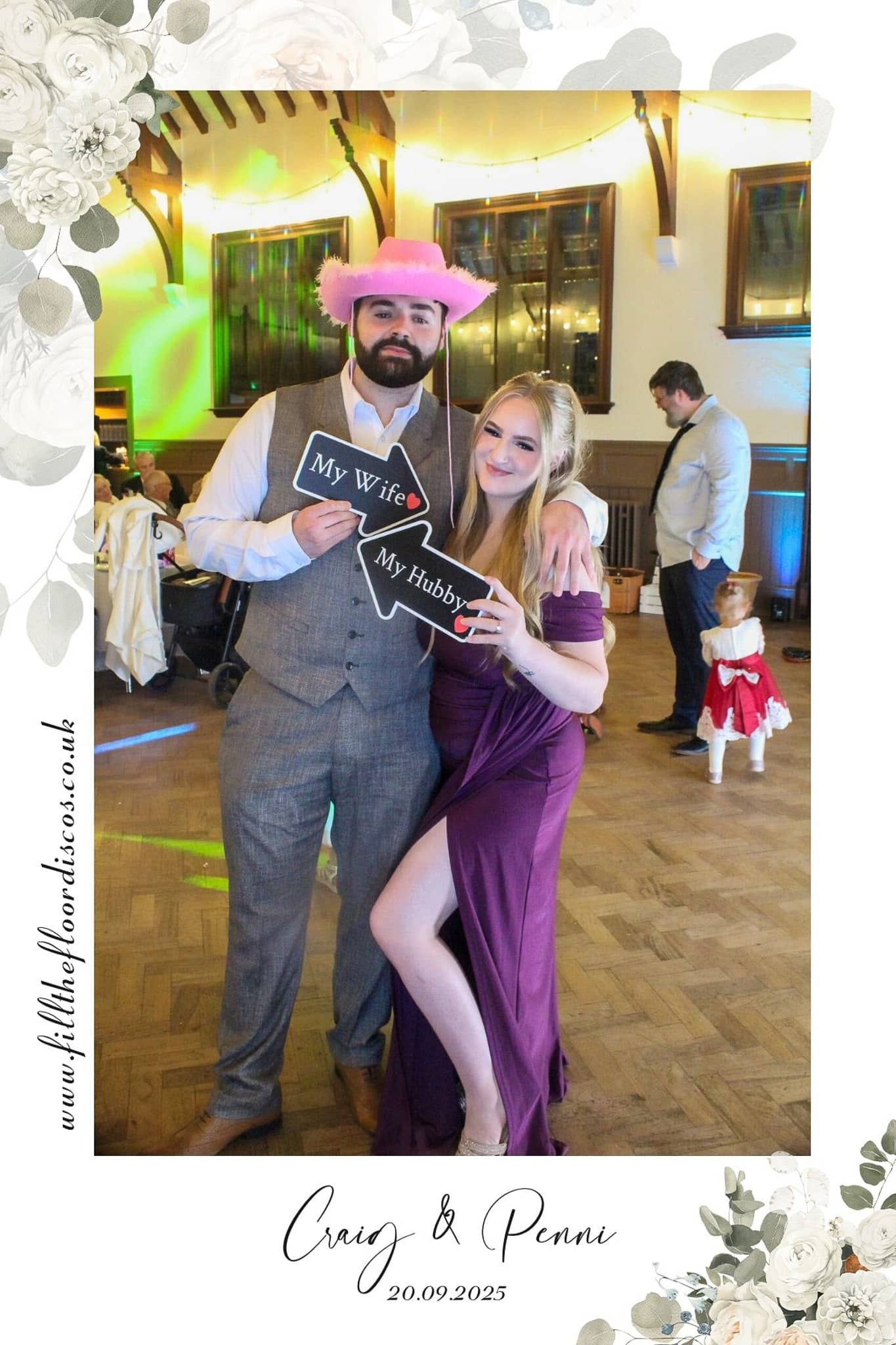 My Wife and My Hubby signs in the wedding photo booth