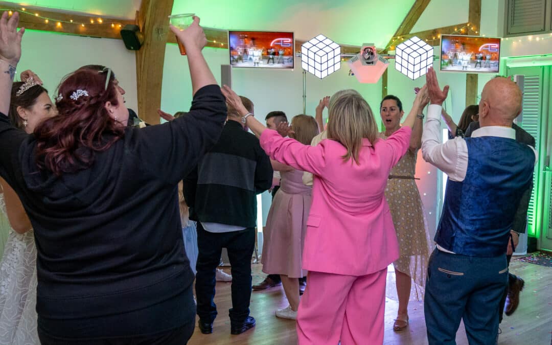 What to Ask Your Wedding DJ Before Booking | 10 Essential Questions