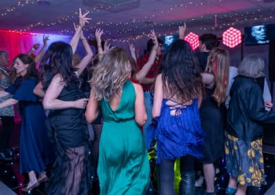 Disco hire Amersham – guests filling the light-up dance floor at a 60th birthday in Buckinghamshire