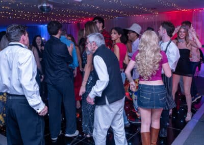 A packed dance floor at a 60th birthday disco at Amersham & Chiltern Rugby Club