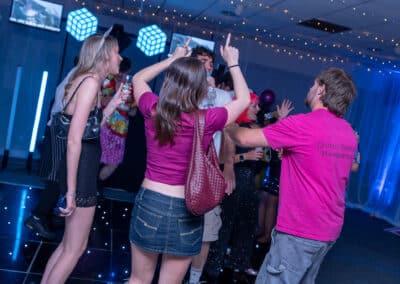 Guests dancing on the black starlit LED dance floor at Amersham & Chiltern Rugby Club