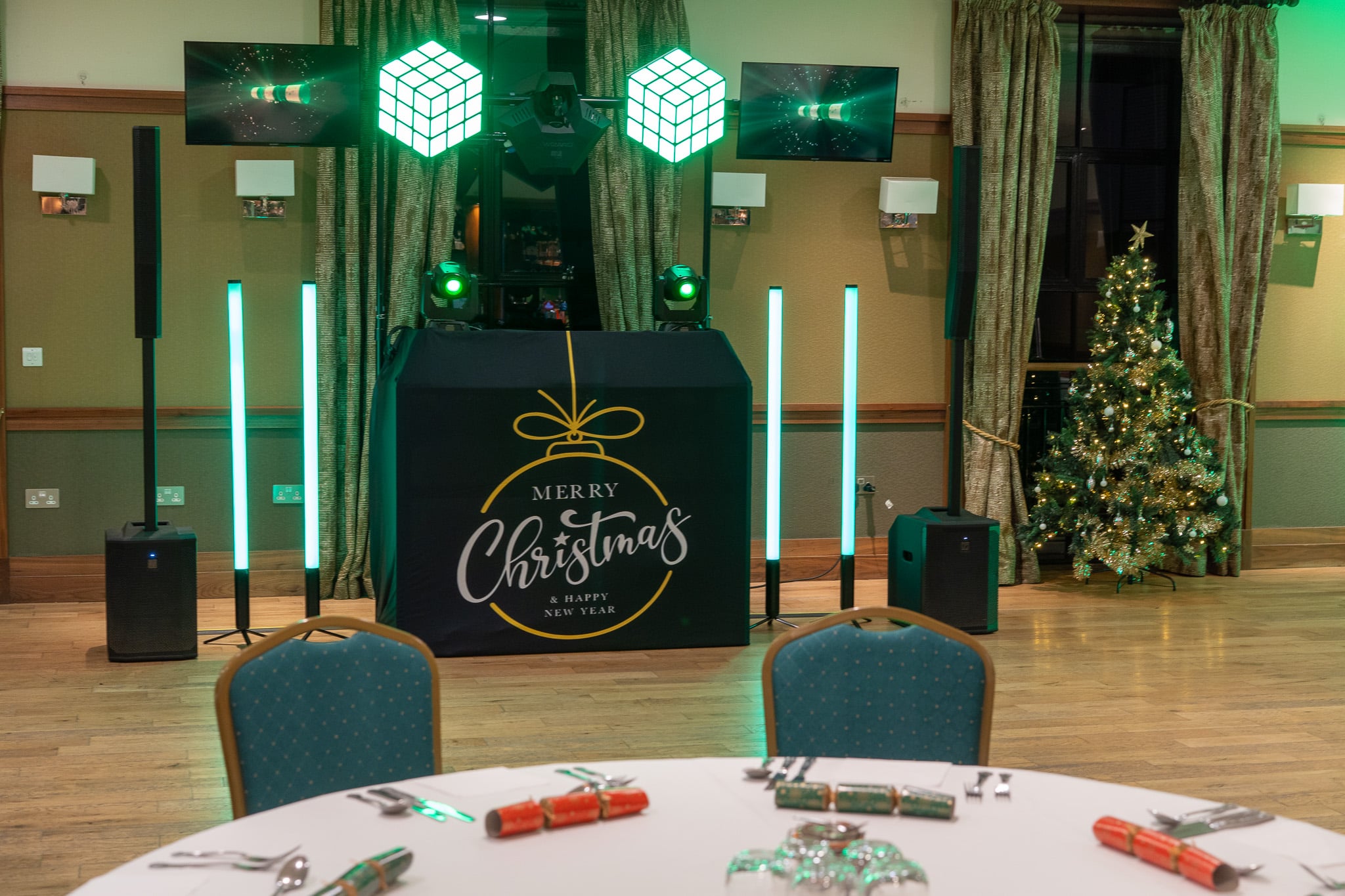 Staff Christmas party disco setup in Buckinghamshire with festive booth and tree