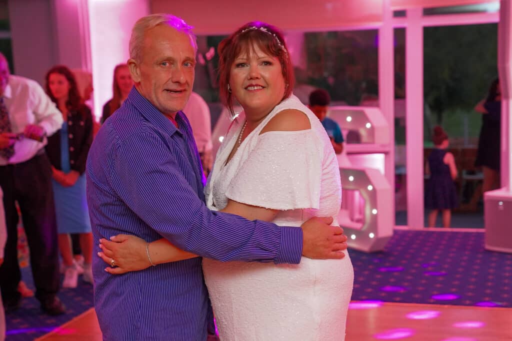 Jim and Carol on the dance floor at their wedding reception, Grim&rsquo;s Dyke Golf Club