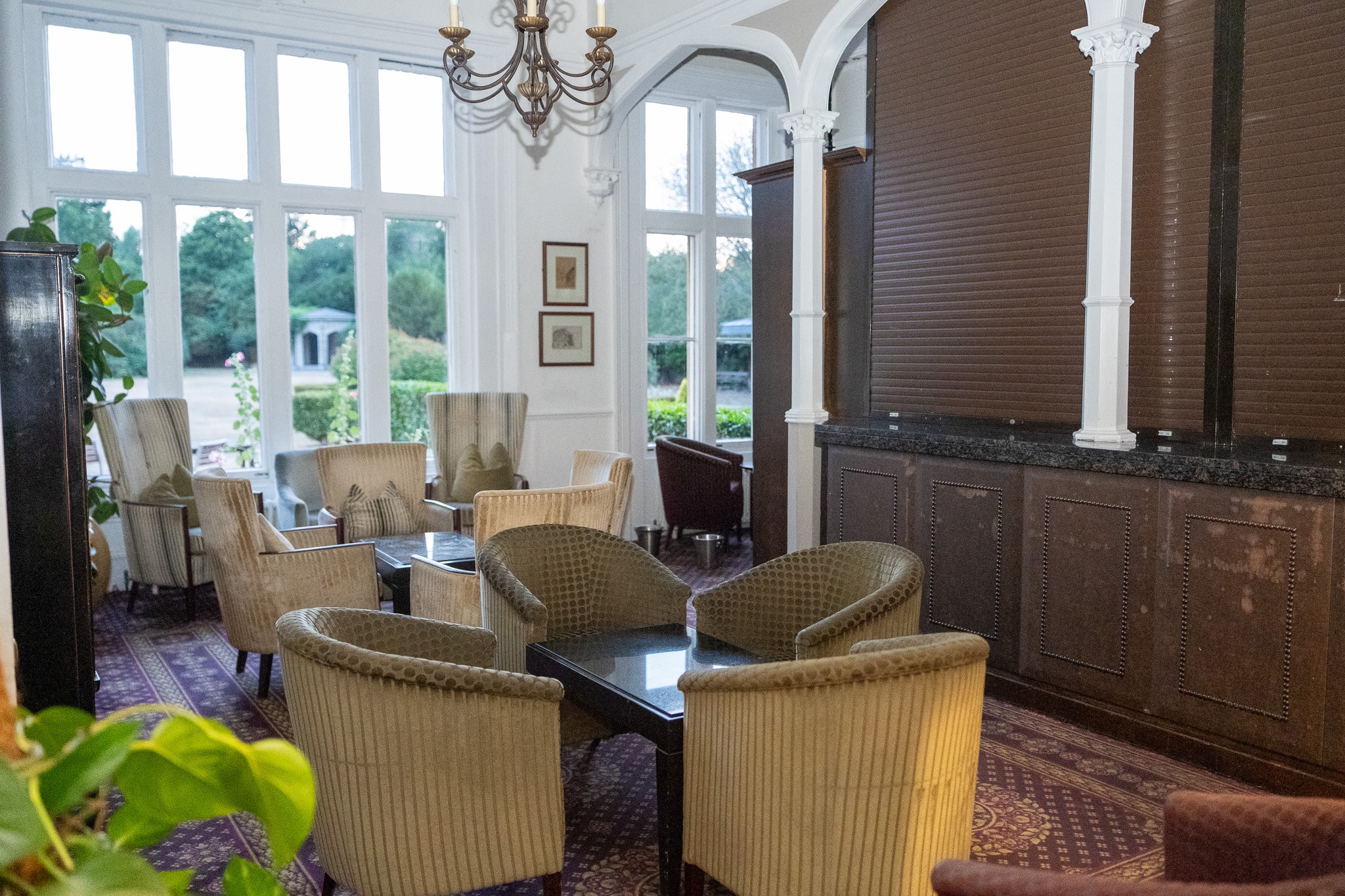 The bar off the Longman Room at Shendish Manor, with big windows over the gardens