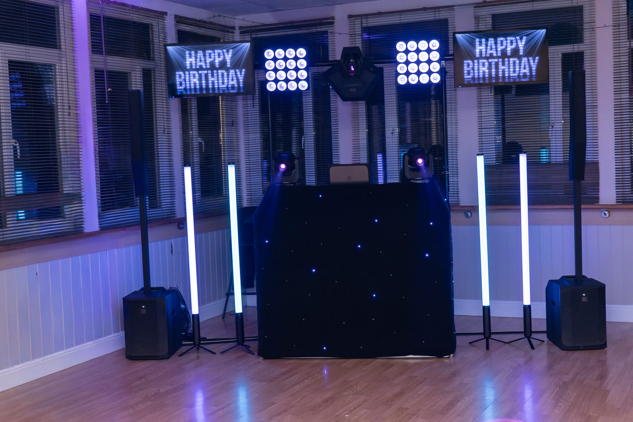 Sleek black 50th birthday DJ setup — one of two looks
