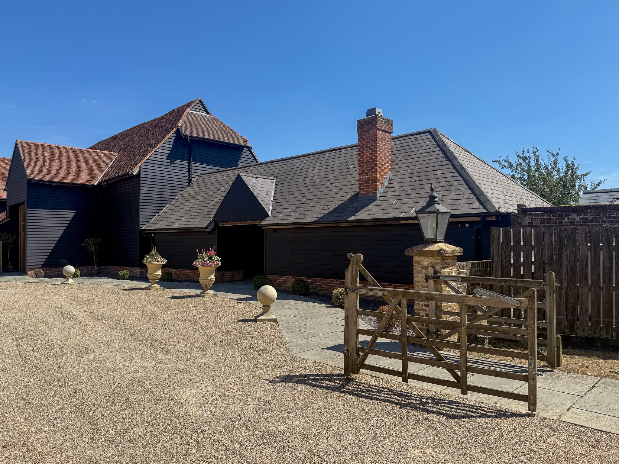 Black weatherboard barns at Micklefield Hall
