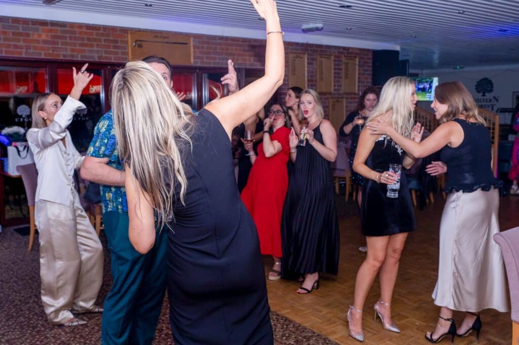 Arms in the air on the dance floor at a 40th birthday party at Chiltern Forest Golf Club