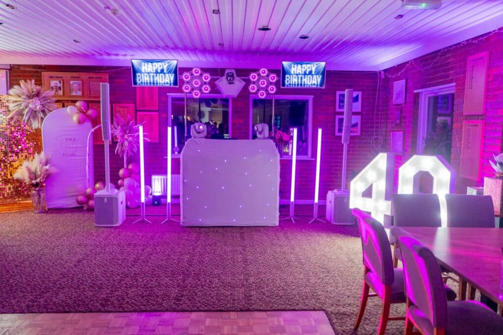 White DJ setup with 4ft light-up 40 numbers ready for Leona’s 40th at Chiltern Forest Golf Club